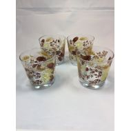 /Mvoddities Set of 4 vintage juice or highball glasses. Clear glass. Daisy and wheat design.