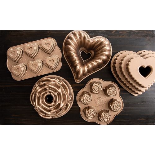  Nordic Ware 90937 Cast Bundt Bakeware Tiered Heart Cakelets: Kitchen & Dining