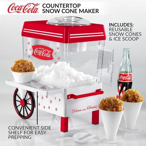  [아마존베스트]Nostalgia SCM550COKE Coca-Cola Countertop Snow Cone Maker Makes 20 Icy Treats, Includes 2 Reusable Plastic Cups & Ice Scoop  White/Red