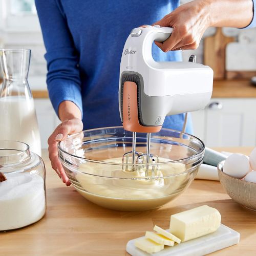  Oster 270-Watt Hand Mixer with HEATSOFT Technology and Whisk, Dough Hooks, and Storage Case