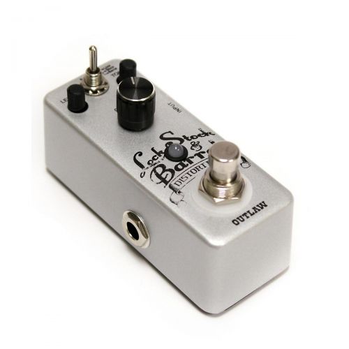  Outlaw Effects},description:Lock Stock & Barrel is a versatile distortion pedal that converts your clean tone into the powerful, saturated grit that youd hear from a vintage, high-