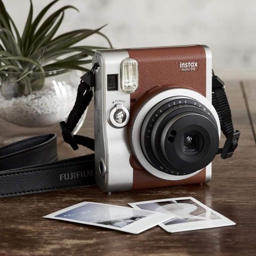  Fujifilm INSTAX Mini 90 Neo Classic Instant Camera (Brown) + Fujifilm Instax Mini Instant Film (20 Exposures) + Compact Camera Case + Sticker Frames Sports Package + Photo4Less Cle