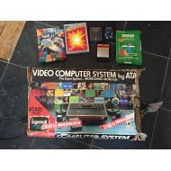 /Etsy Vintage 1978 Atari CX2600 woody video computer system