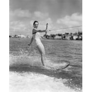 Posterazzi 1950s Smiling Woman In Bathing Suit Water Skiing Waving One Hand Looking At Camera Rolled Canvas Art - Vintage Images ()