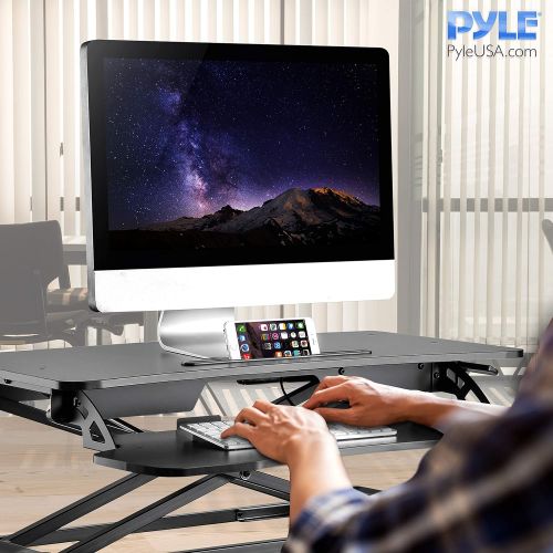  Jovial Pyle Ergonomic Standing Desk & PC Monitor Riser - Height Adjustable Laptop & Computer Table w Wide Keyboard Tray - Black Sit & Stand Desktop Workstation Converter for Office or Ga