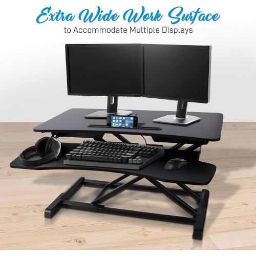  Jovial Pyle Ergonomic Standing Desk & PC Monitor Riser - Height Adjustable Laptop & Computer Table w Wide Keyboard Tray - Black Sit & Stand Desktop Workstation Converter for Office or Ga