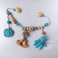 /Etsy Stroller garland Crochet baby carriage chain with rattle, squeaking toy, jelly fish, wooden teether Customized baby gift Mother's day sale
