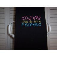 /SistersGardenCrafts Black kitchen towel with machine embroidery sisters friend quote.