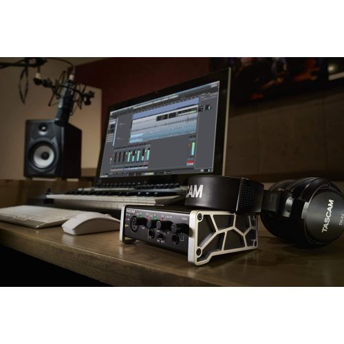  Tascam US-4x4 USB AudioMIDI Interface with Microphone Preamps and iOS Compatibility