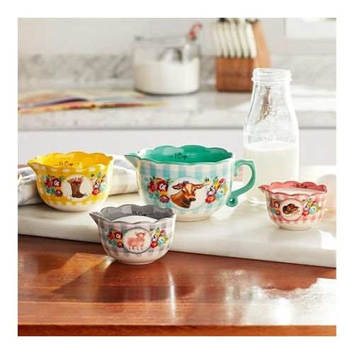  The Pioneer Woman Ceramic Measuring Cup Set Sweet Romance Blossoms 4-Piece Made of stoneware, this kitchen prep set includes a four-piece nesting measuring bowl set