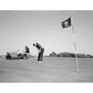 The Poster Corp 1960s Man Playing Golf Putting Golf Ball Towards Flag And Cup Hole On 9Th Green Spring Summer Outdoor Print By Vintage