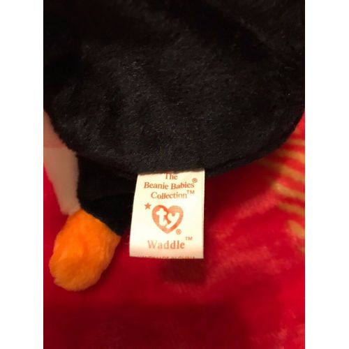  Ty Waddles the penguin 1995 mint condition with tush tag and hang tag