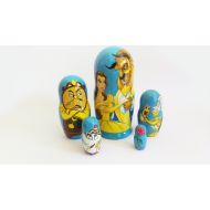 /Etsy Hand-painting nesting dolls "Beauty and the beast".Height 15 cm. Wooden nesting dolls