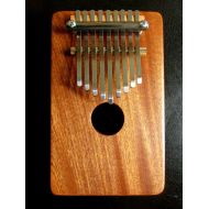 /VeersinghtKalimbas Electric kalimba, solid mahogany, 9 keys. Custom tuning scale.