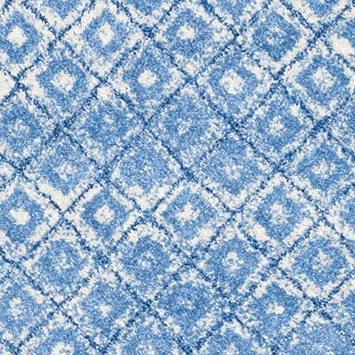  Visit the Safavieh Store Safavieh Adirondack Collection ADR110D Silver and Blue Vintage Distressed Area Rug (6 x 9)