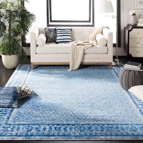  Visit the Safavieh Store Safavieh Adirondack Collection ADR110D Silver and Blue Vintage Distressed Area Rug (6 x 9)