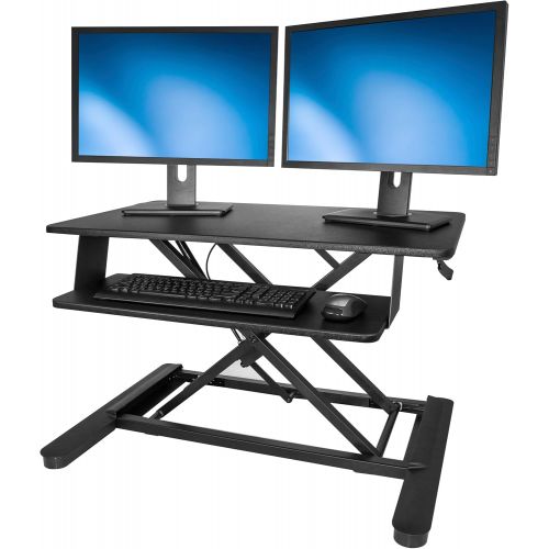  StarTech Sit Stand Desk - 35 Work Surface - Supports Two 24 Monitors - Standing Desk - Adjustable Desk Riser - Stand Up Desk