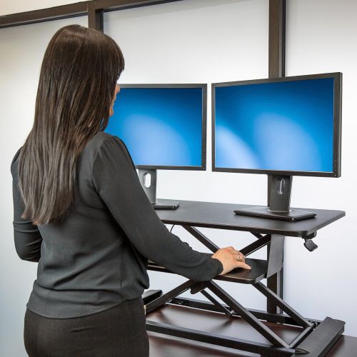  StarTech Sit Stand Desk - 35 Work Surface - Supports Two 24 Monitors - Standing Desk - Adjustable Desk Riser - Stand Up Desk