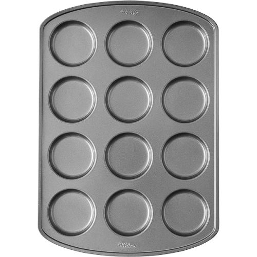  Wilton Perfect Results Premium Non-Stick Bakeware Muffin Top Pan - The Shallow Baking Cups Make Perfect Muffin Tops, Drop Cookies or Whoopie Pie Shells, 12-Cavity, Steel