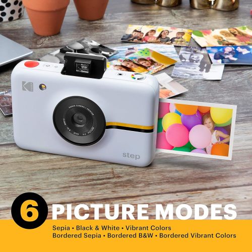  Kodak Step Instant Camera with 10MP Image Sensor, Zink Zero Ink Technology (White) Bundle: Photo Album, Case, 20 Pack Zink Paper, Markers, Stickers.