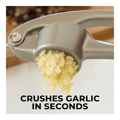  Zulay Kitchen Premium Garlic Press Set - Rust Proof & Dishwasher Safe Professional Garlic Mincer Tool - Easy-Squeeze, Easy-Clean with Soft, Ergonomic Handle - Silicone Garlic Peeler & Brush (Silver)