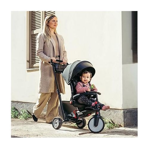  smarTrike STR7 6 in 1 Pushchair, Stroller, and Tricycle for 6-36 Months, With 5-Point Harness, Detachable Canopy, Storage bag, and Removeable Pedals, Black