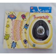19961997 Bandai Original TAMAGOTCHI Virtual Pet v1 SILVER & BLACK #1800 NEW