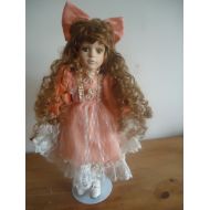AntiqueTreasuresCo Stunning french bisque porcelain doll 17, with a stand