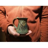 /PotsbydePerrot ceramic coffee mug in Green Leaf Glaze with white pine
