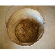 1stFloorAttic old pail-banged up-used as planter-rustic-primitive-yard art-metal pail and handle-salvage-