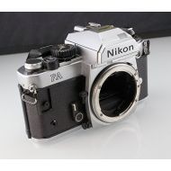 Nikon FA SLR film camera in chrome body; lens is not included
