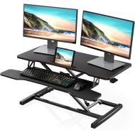FITUEYES Height Adjustable Standing Desk Converter 36” Wide Sit to Stand Up Desk Tabletop Workstation with Wide Keybroad Tray Black SD309101WB
